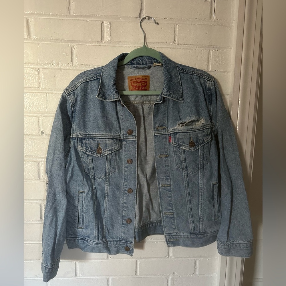 Levi’s classic distressed Jean jacket. Size small